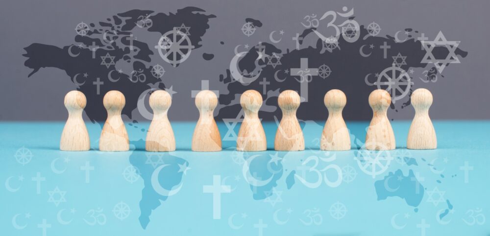 World religion day, people with symbols of different religious belief, Christianity, Islam, Hinduism, Buddhism, Judaism faith, worldwide celebration